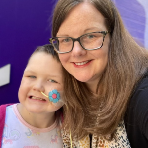 Courtney Comer with her children impacted by Perlman syndrome. Advocating for genetic testing.